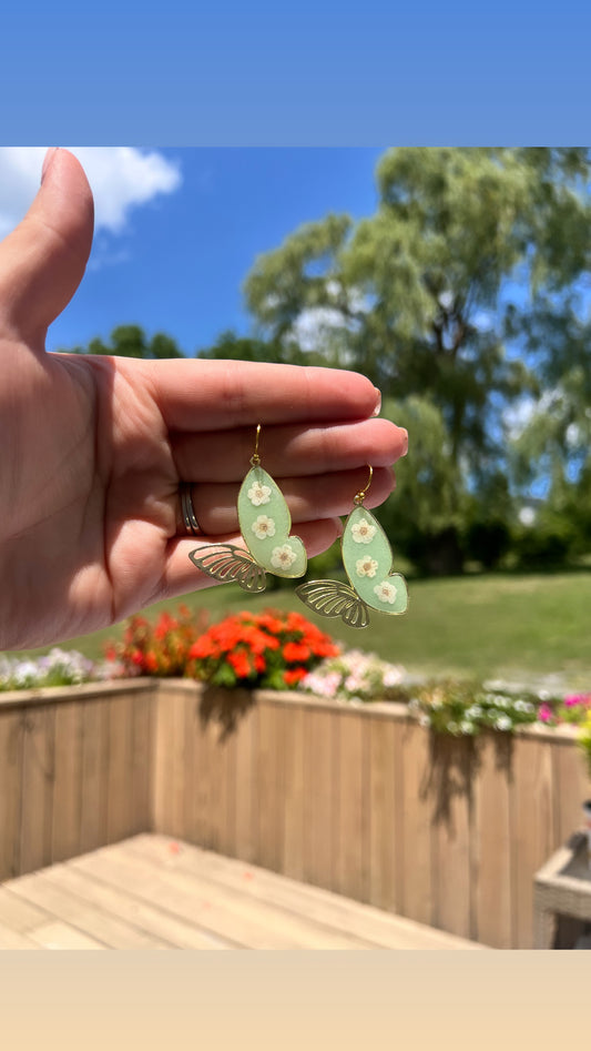 Butterfly dangles with forget me nots