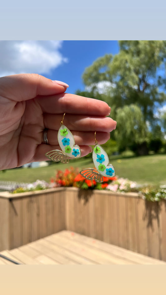 Butterfly dangles with forget me nots